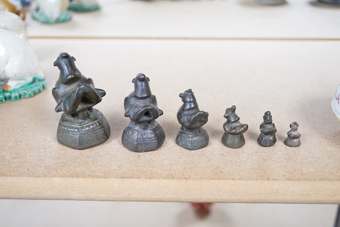 A graduated set of six Burmese bird opium weights, 7cm high